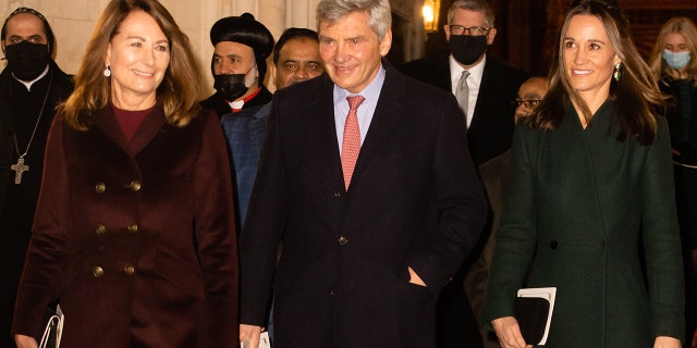 Pippa Middleton with her parents Carole and Michael Middleton.