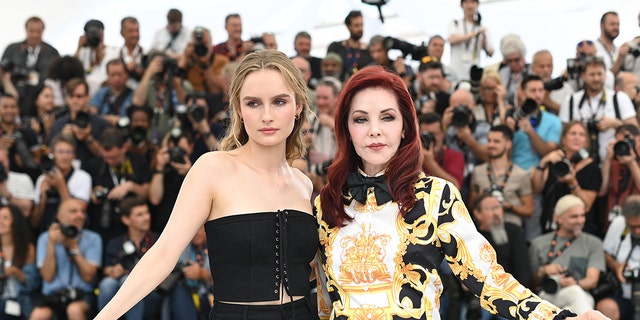 Olivia DeJonge and Priscilla Presley attend the photo call for "Elvis" during the 75th annual Cannes Film Festival at Palais des Festivals May 26, 2022, in Cannes, France. 