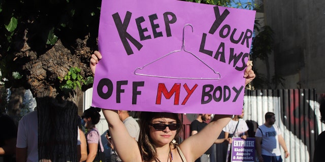 ATTIKA, GREECE - 2022/06/28: Pro-choice activists protest against the decision of the Supreme Court of USA to overturn the Row vs Wade decision about abortions in Athens. (Photo by George Panagakis/Pacific Press/LightRocket via Getty Images)