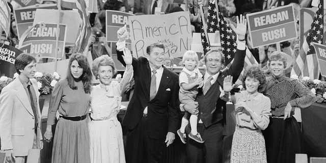 GOP presidential candidate Ronald Reagan and his family join in the jubilation at the Republican National Convention following Reagan's acceptance speech on 7/17. Left to right: Reagan's son and daughter, Ronald and Patti; wife Nancy Reagan; son Michael with grandson Cameron and daughter-in-law, Colleen; and daughter Maureen.