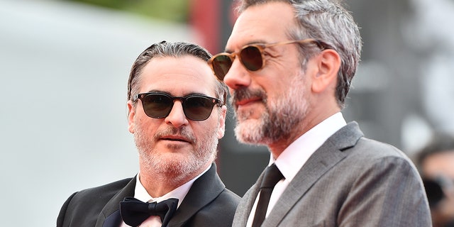 Director Todd Phillips and Joaquin Phoenix of ‘The Joker’ walk the red carpet ahead of the closing ceremony of the 76th Venice Film Festival at Sala Grande on Sept. 7, 2019, in Venice, Italy.