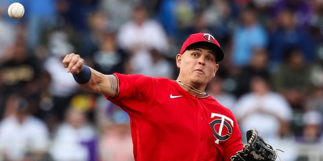 Gio Urshela of the Twins throws to first to get out Jose Trevino of the New York Yankees at Target Field on June 7, 2022, in Minneapolis, Minnesota.