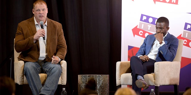 Mayor Glenn Jacobs and Shermichael Singleton speak onstage during Politicon 2019 at Music City Center on Oct. 27, 2019, in Nashville, Tennessee.
