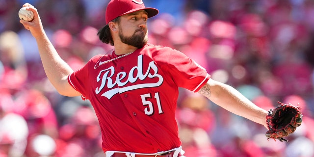Cincinnati Reds starting pitcher Graham Ashcraft throws during the first inning of a baseball game against the Milwaukee Brewers, Saturday, June 18, 2022, in Cincinnati.