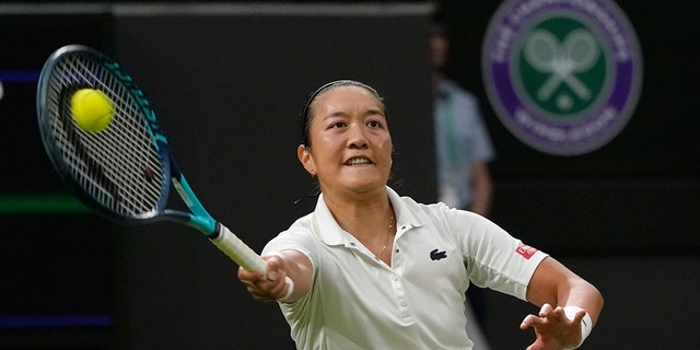 Harmony Tan of France returns to face Serena Williams of the United States in the women's singles first round match on the second day of the Wimbledon Tennis Championships in London, Tuesday 28 June 2022. 
