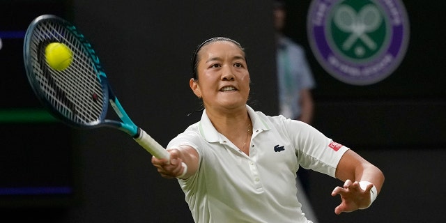 France's Harmony Tan returns to Serena Williams of the US in a first round women's singles match on day two of the Wimbledon tennis championships in London, Tuesday, June 28, 2022.