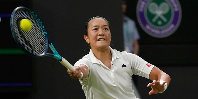 France's Harmony Tan returns to Serena Williams of the US in a first round women's singles match on day two of the Wimbledon tennis championships in London, Tuesday, June 28, 2022. 