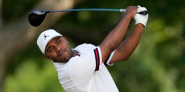 Harold Varner III watches his shot on the fourth hole during the first round of the U.S. Open golf tournament at The Country Club, Thursday, June 16, 2022, in Brookline, Mass.