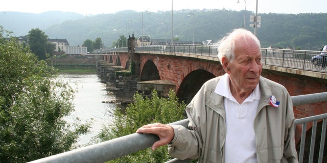 Whisler in 2010 revisiting the Roman Bridge in Trier, Germany, where he met Patton.