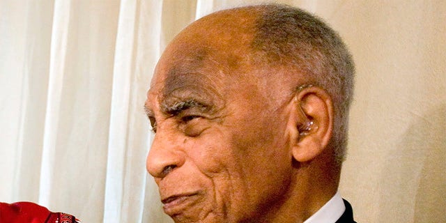 Order of Canada recipient Herb Carnegie, former star of the Quebec Aces through the 1940s, is shown during a news conference in Toronto, June 7, 2009. Carnegie was elected to the Hockey Hall of Fame, Monday, June 27, 2022.