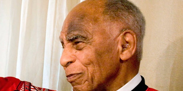 Order of Canada recipient Herb Carnegie, former star of the Quebec Aces through the 1940s, is shown during a news conference in Toronto, June 7, 2009. Carnegie was elected to the Hockey Hall of Fame, Monday, June 27, 2022.