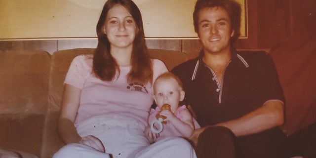 Photo shows "Baby Holly" with her parents before their apparent murders in the 1980s