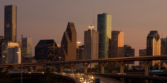 File photo of traffic flowing in Houston, Texas at sunset. 