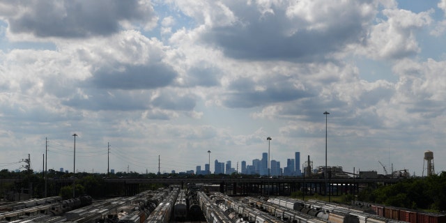 The Houston skyline is seen beyond a railroad yard by the Houston Ship Channel in Houston, Texas, U.S., May 5, 2019. 