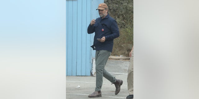 The White House's first son appeared in California on Tuesday afternoon in a brown baseball cap and casual clothes.