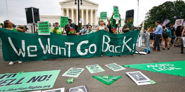 Demonstrators outside the Supreme Court Tuesday morning ahead of the announcement on Dobbs v. Jackson, in June 2022.