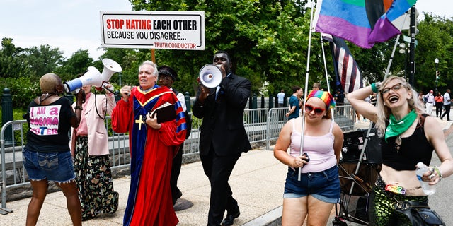 WASHINGTON D.C. - JUNE 21: Demonstrators outside the Supreme Court Tuesday ahead of possible announcement on Dobbs v. Jackson