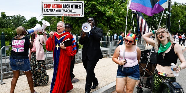 WASHINGTON D.C. - JUNE 21: Demonstrators outside the Supreme Court Tuesday ahead of possible announcement on Dobbs v. Jackson