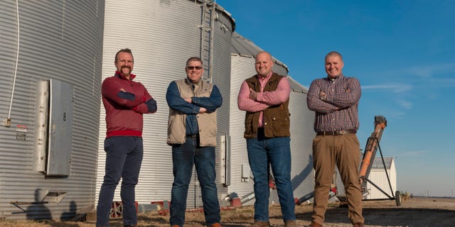 Illinois gubernatorial candidate Darren Bailey and his sons on their family farm.