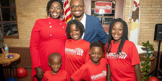 Butler and members of his family.