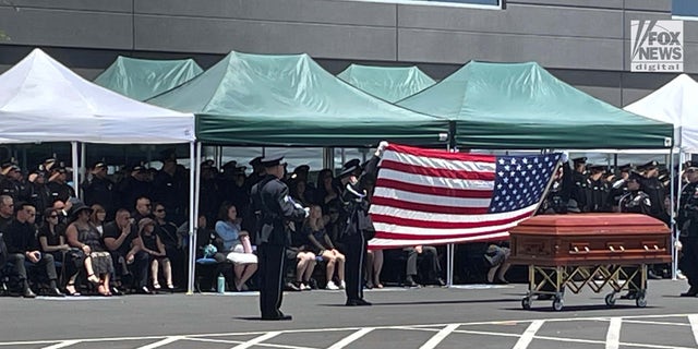 A procession in June 2022 for two police officers who were killed in the line of duty in El Monte, California. 