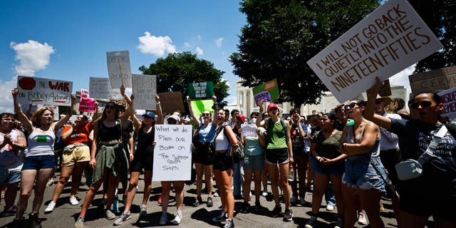 Protesters gather in front of the Supreme Court building in Washington D.C. following the ruling to overturn Roe vs. Wade.