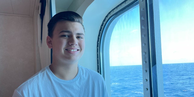Elijah, who is 15, is shown during a family vacation in Aruba. "Thank God," said Jamie Greene, "that [a Facebook] post got to the right people who were able to help get us home." 