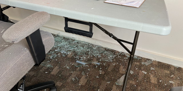 Glass from a broken window in the shared office of Jackson's right to life and Congressman Tim Wolberg's campaign, which appeared to have been destroyed by Jane's revenge.