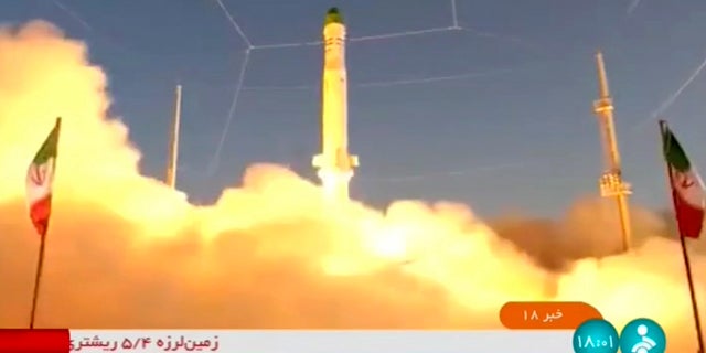 An Iranian satellite-carrier rocket, called "Zuljanah," blasts off from an undisclosed location in footage released Sunday, June 26, 2022, by Iran state TV.