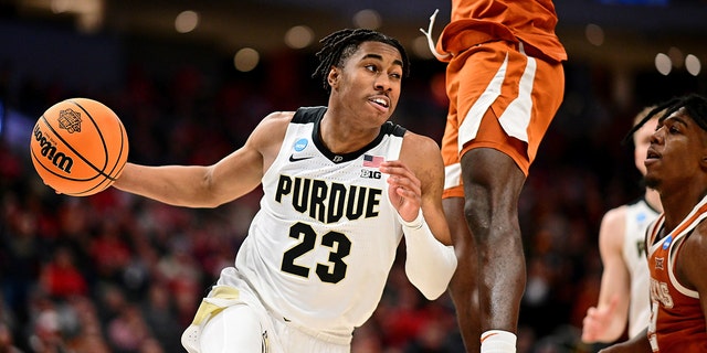 Jaden Ivey #23 of the Purdue Boilermakers dribbles the ball against the Texas Longhorns during the second round of the 2022 NCAA Men's Basketball Tournament held at the Fiserv Forum on March 20, 2022 in Milwaukee, Wisconsin.