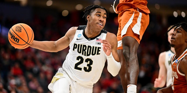 Jaden Ivey #23 of the Purdue Boilermakers dribbles the ball against the Texas Longhorns during the second round of the 2022 NCAA Men's Basketball Tournament held at the Fiserv Forum on March 20, 2022 in Milwaukee, Wisconsin.