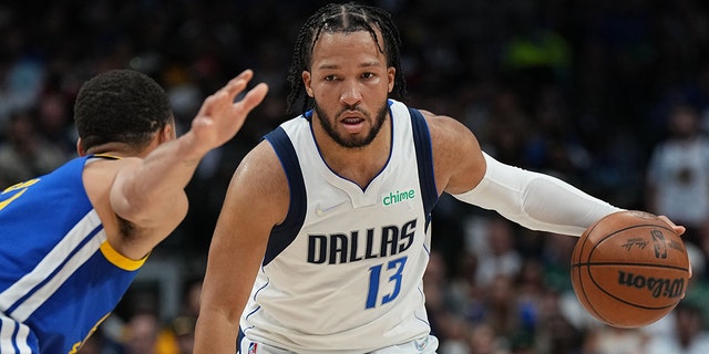 Jalen Brunson #13 of the Dallas Mavericks dribbles the ball during Game 4 of the 2022 NBA Playoffs Western Conference Finals against the Golden State Warriors on May 24, 2022 at the American Airlines Center in Dallas, Texas. 