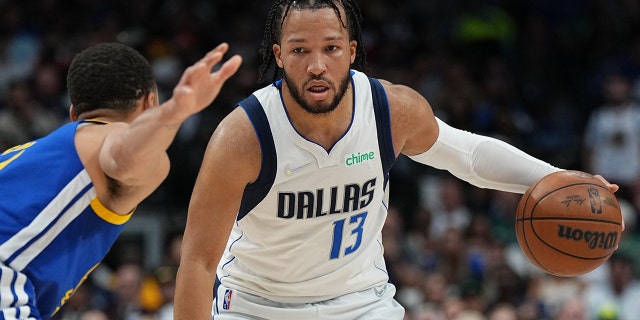 Jalen Brunson #13 of the Dallas Mavericks dribbles the ball during Game 4 of the 2022 NBA Playoffs Western Conference Finals against the Golden State Warriors on May 24, 2022 at the American Airlines Center in Dallas, Texas. 