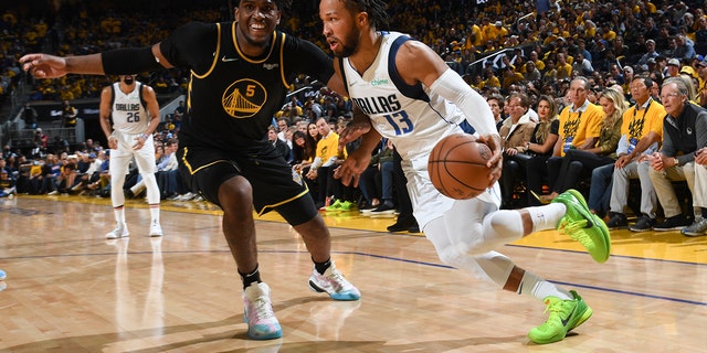 Jalen Brunson of the Dallas Mavericks drives to the basket against the Golden State Warriors during Game 5 of the 2022 NBA Western Conference finals May 26, 2022, at Chase Center in San Francisco.