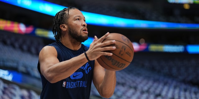 Jalen Brunson of the Dallas Mavericks warms up before a game against the Golden State Warriors before Game 4 of the 2022 NBA Western Conference finals May 24, 2022, at the American Airlines Center in Dallas, Texas.