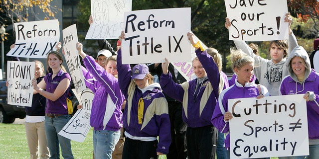 Students from James Madison University take part in a rally outside the Education Department in Washington, Thursday, Nov. 2, 2006. Earlier in 2006, James Madison announced that it would drop 10 of its athletic teams in order to bring the school into compliance with the federal law demanding equity in male and female sports.