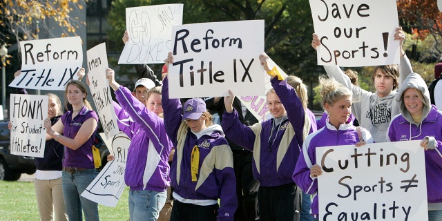 Students from James Madison University take part in a rally outside the Education Department in Washington, Thursday, Nov. 2, 2006. Earlier in 2006, James Madison announced that it would drop 10 of its athletic teams in order to bring the school into compliance with the federal law demanding equity in male and female sports.