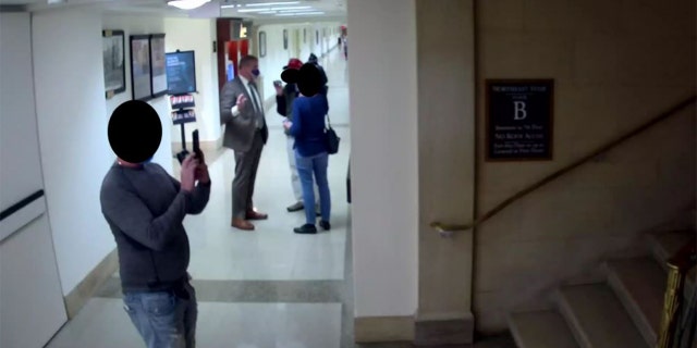 The House Jan. 6 committee released images from surveillance video of a U.S. Capitol tour conducted by Republican Rep. Barry Loudermilk, Jan. 5, 2021.