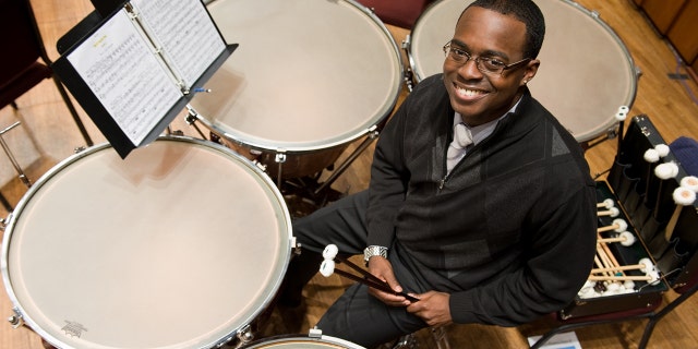 The National Symphony Orchestra's principal timpanist Jauvon Gilliam is pictured on stage at The Kennedy Center in Washington, D.C., on March 10, 2010, shortly after he was named to his position.