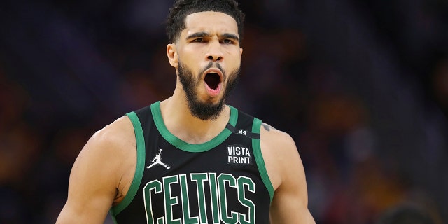 Boston Celtics forward Jayson Tatum (0) reacts after playing against the Golden State Warriors in the second half of Game 5 of the NBA Finals basketball in San Francisco on Monday, June 13, 2022.