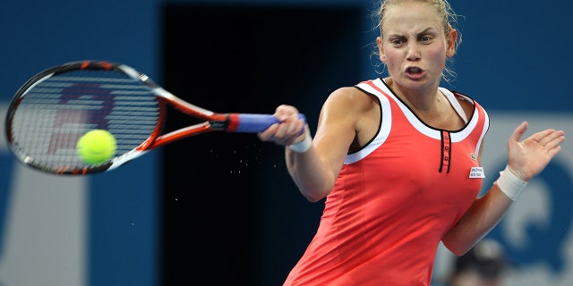 Jelena Dokic of Australia to plays a forehand during her first round match against Ana Ivanovic of Serbia during day two of the Brisbane International 2010 at Queensland Tennis Centre on January 4, 2010 in Brisbane, Australia.
