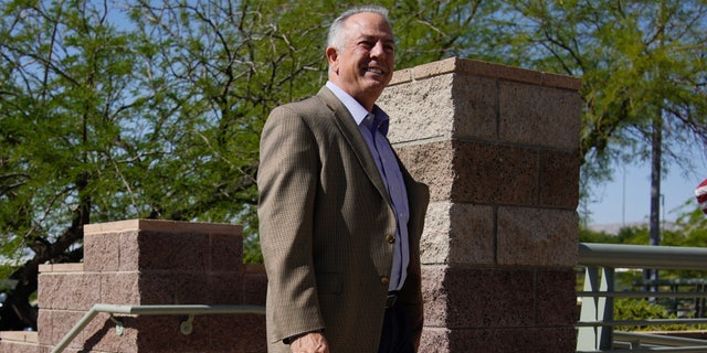 Clark County Sheriff and Republican candidate for Nevada governor Joe Lombardo arrives at a polling place before voting Tuesday, June 14, 2022, in Las Vegas. (AP Photo/John Locher)
