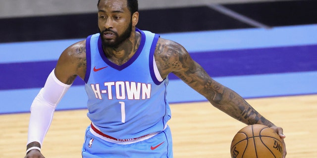 FILE - Houston Rockets' John Wall controls the ball during the third quarter against the Indiana Pacers in an NBA basketball game April 14, 2021, in Houston.  