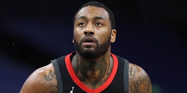 John Wall, #1 of the Houston Rockets, looks on during the game against the Minnesota Timberwolves on March 27, 2021 at Target Center in Minneapolis, Minnesota.  