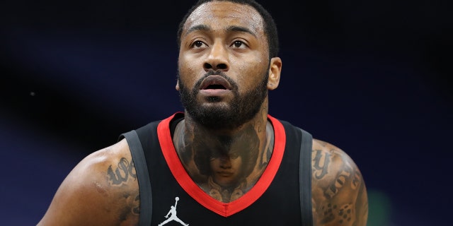 John Wall, #1 of the Houston Rockets, looks on during the game against the Minnesota Timberwolves on March 27, 2021 at Target Center in Minneapolis, Minnesota.  