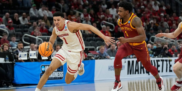 Johnny Davis of the Badgers drives against the Iowa State Cyclones during the NCAA Men's Basketball Tournament at the Fisher Forum on March 20, 2022 in Milwaukee, Wisconsin.