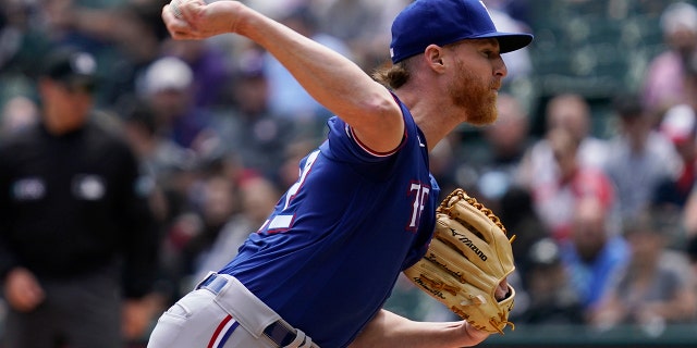 Texas Rangers starting pitcher Jon Gray throws against the White Sox in Chicago, Sunday, June 12, 2022.