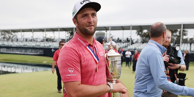 Spain’s Jon Rahm exits the trophy ceremony after competing in the final round of the 2021 US Open at the Torrey Pines Golf Course (Southern Course) on June 20, 2021 in San Diego, California.