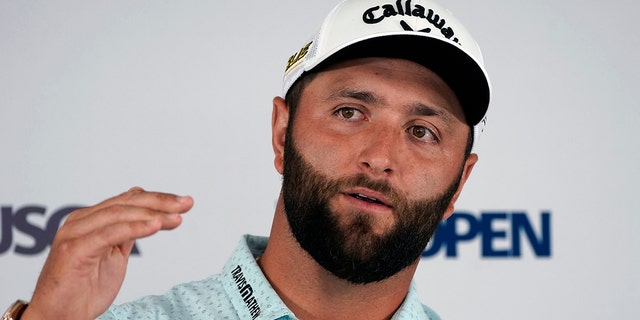 Jon Rahm, of Spain, answers a reporter's question during a media availability ahead of the U.S. Open golf tournament, Tuesday, June 14, 2022, at The Country Club in Brookline, Mass. 
