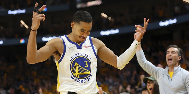 Golden State Warriors guard Jordan Poole (3) celebrates after scoring against the Boston Celtics during the second half of Game 5 of basketball's NBA Finals in San Francisco, Monday, June 13, 2022.